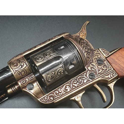 549 - Replica Colt 45. The Gun that won the West!
Fully Engraved 1869 Colt, with wooden handle. Dry firing... 