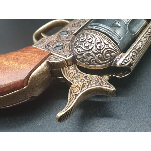 549 - Replica Colt 45. The Gun that won the West!
Fully Engraved 1869 Colt, with wooden handle. Dry firing... 