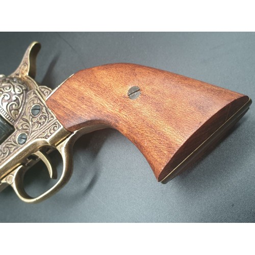 549 - Replica Colt 45. The Gun that won the West!
Fully Engraved 1869 Colt, with wooden handle. Dry firing... 