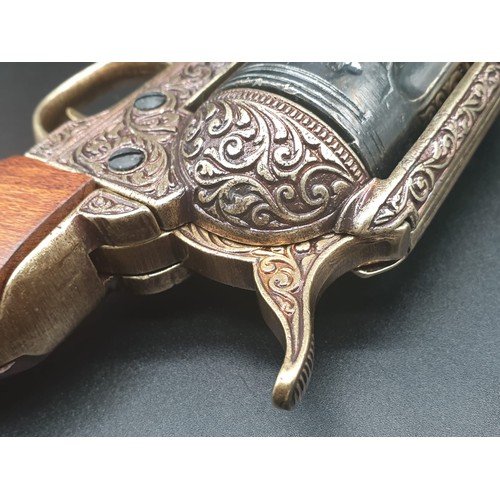 549 - Replica Colt 45. The Gun that won the West!
Fully Engraved 1869 Colt, with wooden handle. Dry firing... 