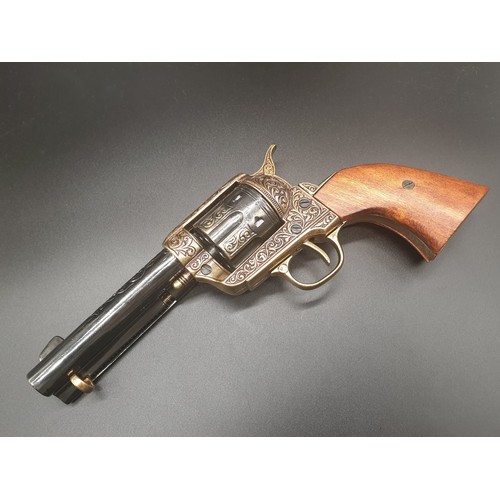 549 - Replica Colt 45. The Gun that won the West!
Fully Engraved 1869 Colt, with wooden handle. Dry firing... 