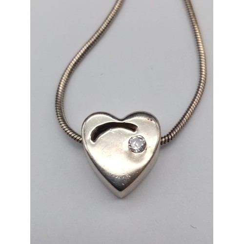 692 - Sterling Silver Stone Set Heart Pendant on Sterling Silver Rope Style Chain in presentation box.
36c... 