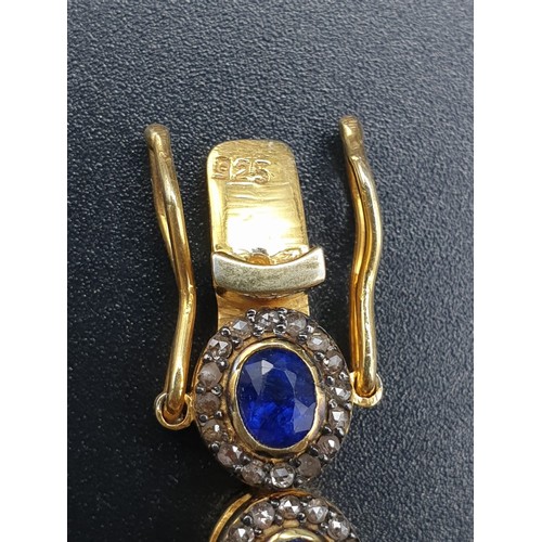 105 - A 925 Silver Gold Plated Bracelet with 4.90ct of 20 pieces of Transparent Blue Oval Faceted Sapphire... 