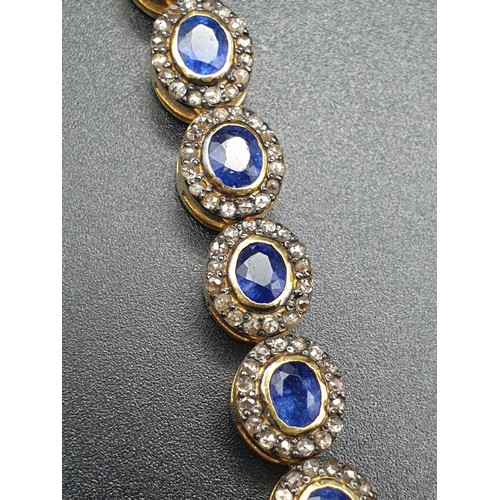 105 - A 925 Silver Gold Plated Bracelet with 4.90ct of 20 pieces of Transparent Blue Oval Faceted Sapphire... 