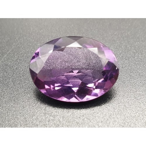 329 - 9.65 Cts Natural Amethyst. in Oval Mix shape. 18 x 13 x 7mm. Come with GLI Certificated