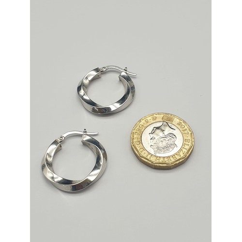 324 - 14K White Gold Twist Hoop Earrings. 2g