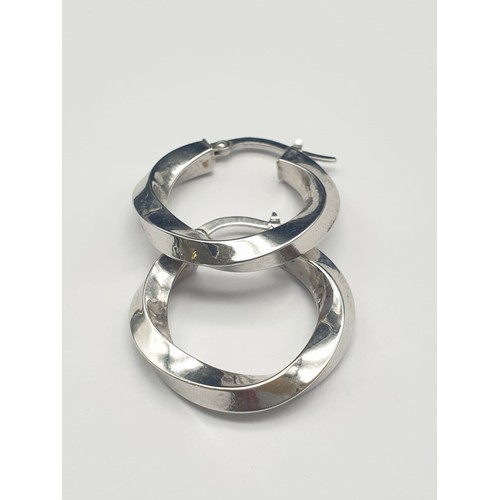 324 - 14K White Gold Twist Hoop Earrings. 2g