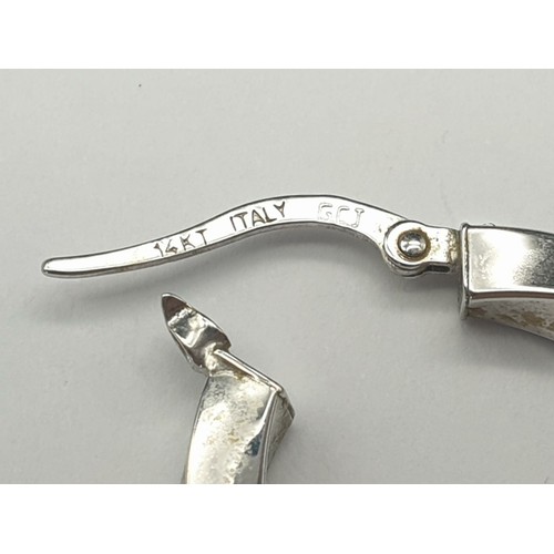 324 - 14K White Gold Twist Hoop Earrings. 2g