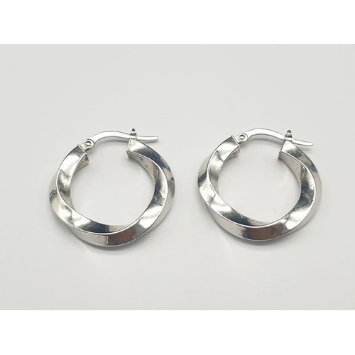 324 - 14K White Gold Twist Hoop Earrings. 2g