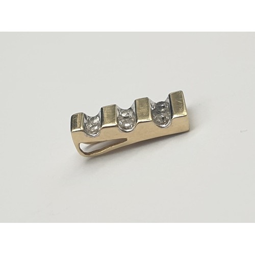 325 - 9K Yellow Gold Three- Diamond Pendant.
.64g.