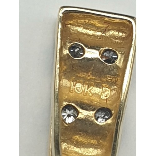 325 - 9K Yellow Gold Three- Diamond Pendant.
.64g.