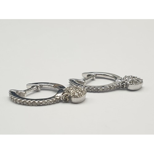 310 - 9K Yellow Gold Diamond Mini Hoop Earrings with Heart Drops. 3G