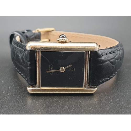 15 - Must de Cartier ladies wristwatch with black square face, gold plate and leather strap, 26mm x 20mm