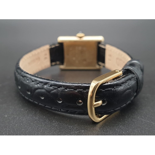 15 - Must de Cartier ladies wristwatch with black square face, gold plate and leather strap, 26mm x 20mm