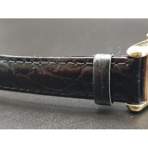 15 - Must de Cartier ladies wristwatch with black square face, gold plate and leather strap, 26mm x 20mm