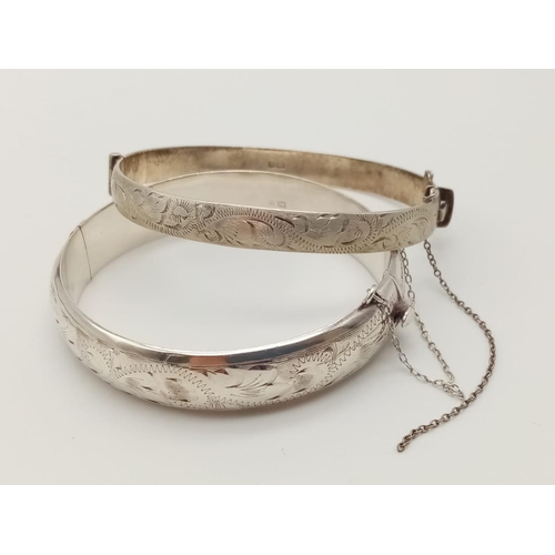 330 - Two Silver Bangles. 5 1/2 and 6cm diameter. 40g