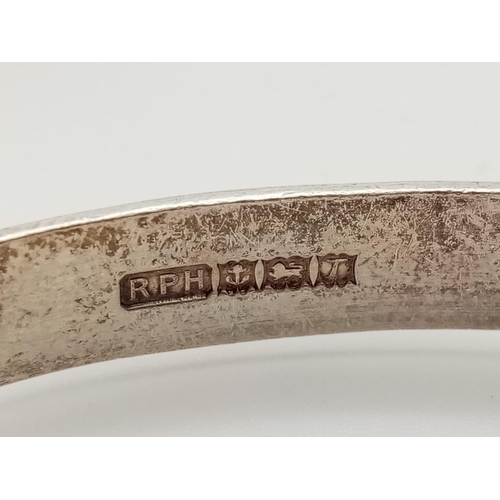 330 - Two Silver Bangles. 5 1/2 and 6cm diameter. 40g