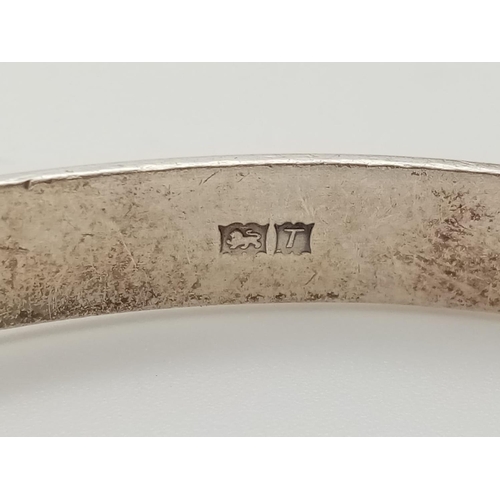 330 - Two Silver Bangles. 5 1/2 and 6cm diameter. 40g