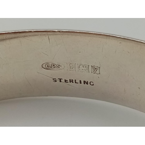 330 - Two Silver Bangles. 5 1/2 and 6cm diameter. 40g