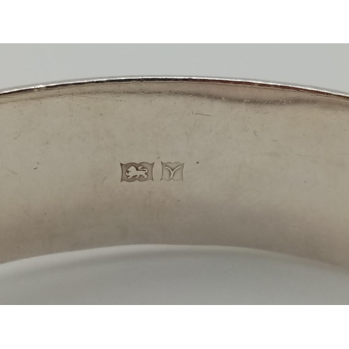 330 - Two Silver Bangles. 5 1/2 and 6cm diameter. 40g