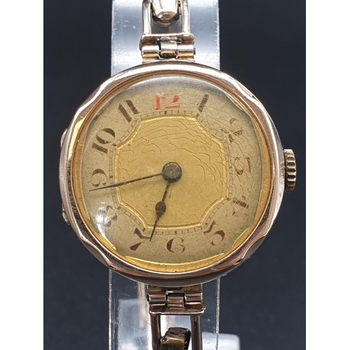 39 - Vintage, possibly Antique 9k Yellow Gold Ladies Watch.
Expandable strap. Gold Dial. As Found. 18g
