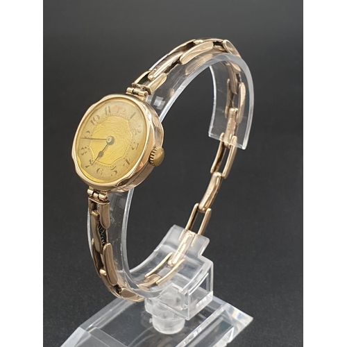 39 - Vintage, possibly Antique 9k Yellow Gold Ladies Watch.
Expandable strap. Gold Dial. As Found. 18g