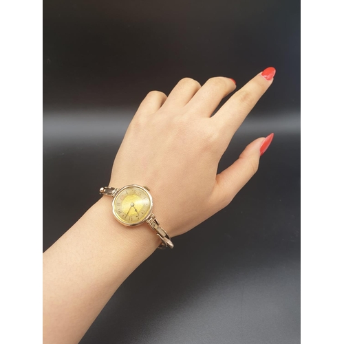 39 - Vintage, possibly Antique 9k Yellow Gold Ladies Watch.
Expandable strap. Gold Dial. As Found. 18g