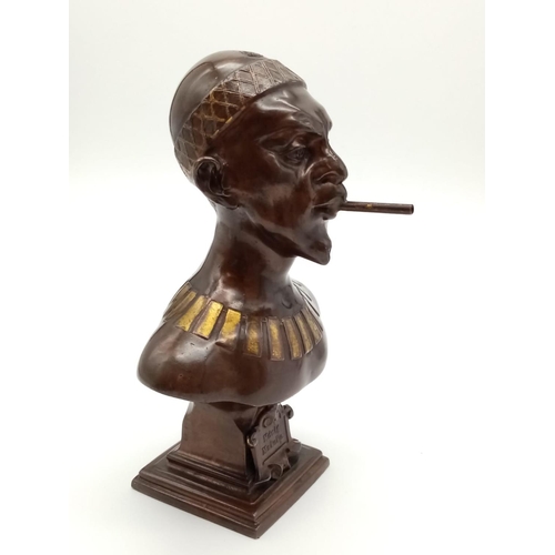 45 - Antique German Bronzed Spelter Cigar Lighter Bust of Konig Makoke. Raised on a square plinth, with g... 