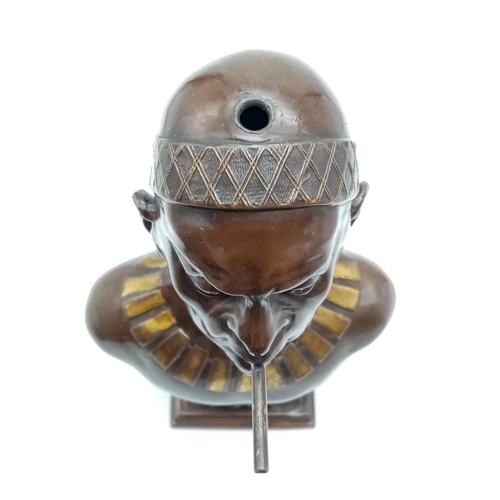 45 - Antique German Bronzed Spelter Cigar Lighter Bust of Konig Makoke. Raised on a square plinth, with g... 