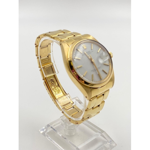22 - AN 18K GOLD ROLEX OYSTER PERPETUAL WITH DATE BOX AND WHITE FACE. 36MM