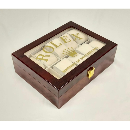 A ROLEX watch display box with shatter proof glass. It