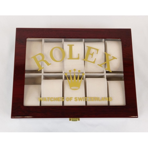 57 - A ROLEX watch display box with shatter-proof glass. It accommodates 10 watches. With velvet interior... 