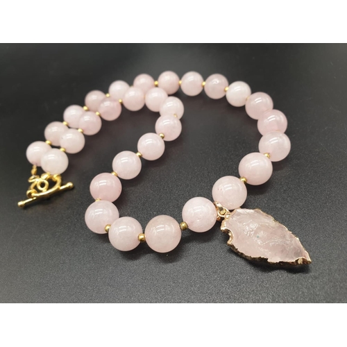 105 - A highly unusual necklace, bracelet and earrings set of large beaded rose quartz adorned with neolit... 