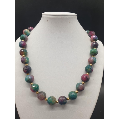 147 - A colourful, veined, faceted, large beaded (13 mm), agate necklace and earrings set. Necklace length... 