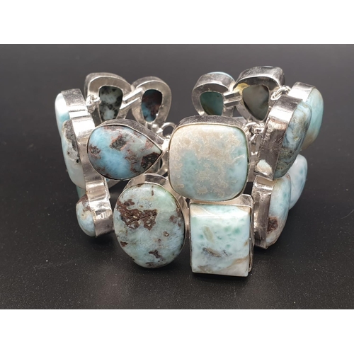 64 - A very attractive and unique looking LARIMAR necklace, bracelet and earrings set in a presentation b... 