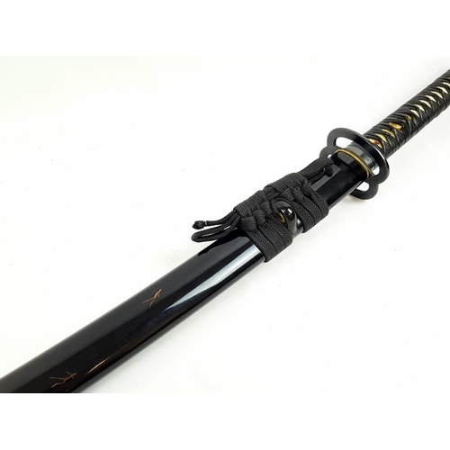 277 - A QUALITY SAMURAI SWORD WITH SHARK OR STINGRAY SKIN (SHAGREEN) HANDLE AND SUBTLE DECORATION ON THE S... 