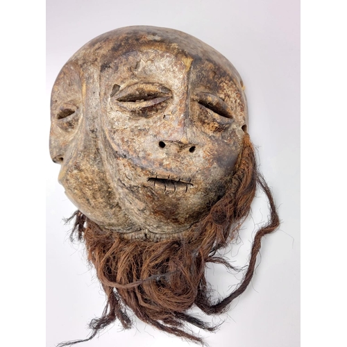 216 - An Antique African Tribal Double-Face Dancing Mask. 
Used by the Liga Tribe of The Congo to celebrat... 