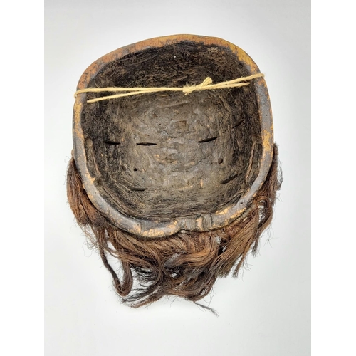 216 - An Antique African Tribal Double-Face Dancing Mask. 
Used by the Liga Tribe of The Congo to celebrat... 