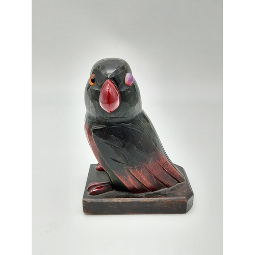 384 - A Pair of Early Carved wooden Love Bird Bookends with Cherry-Amber Beaks and Feet. 9 x 13.5cm