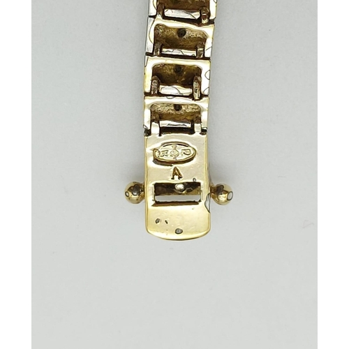 235 - A Silver Gilt and Diamond Tennis Bracelet. 20cm.
17.3g total.