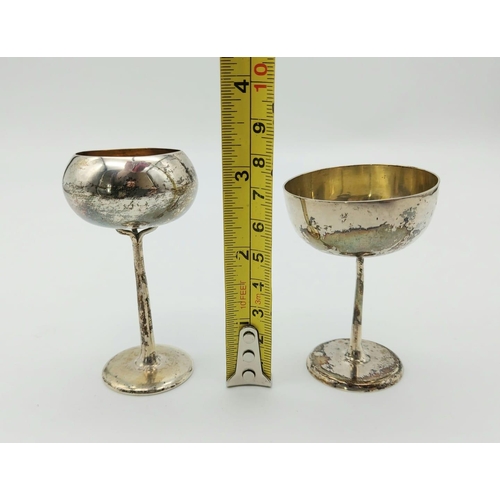 237 - Two Antique Chinese Silver Wine Cups. 8 and 7cm.
53g total.