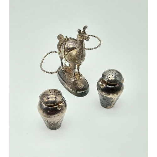 258 - An Antique Peruvian Novelty Cruet Salt and Pepper Set 
Housed on a Llamas Back. Hallmarked silver - ... 