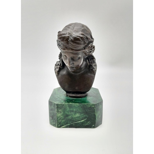 337 - A French Bronze Bust on a Malachite Base. Signed by the sculptor. 15.5cm tall.