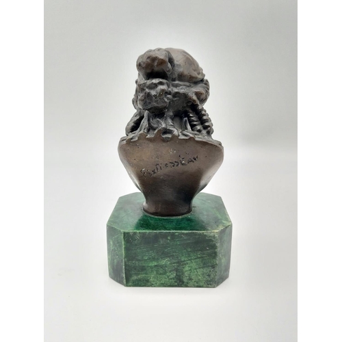 337 - A French Bronze Bust on a Malachite Base. Signed by the sculptor. 15.5cm tall.