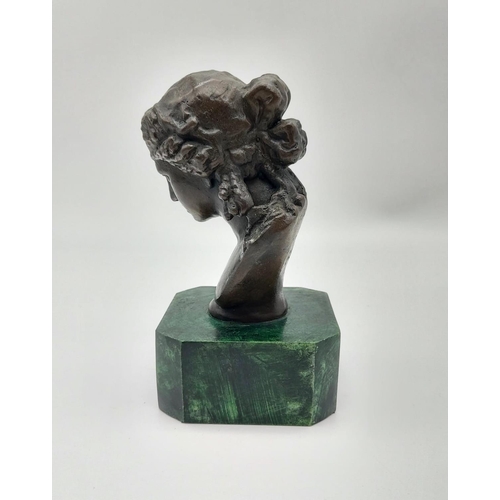 337 - A French Bronze Bust on a Malachite Base. Signed by the sculptor. 15.5cm tall.