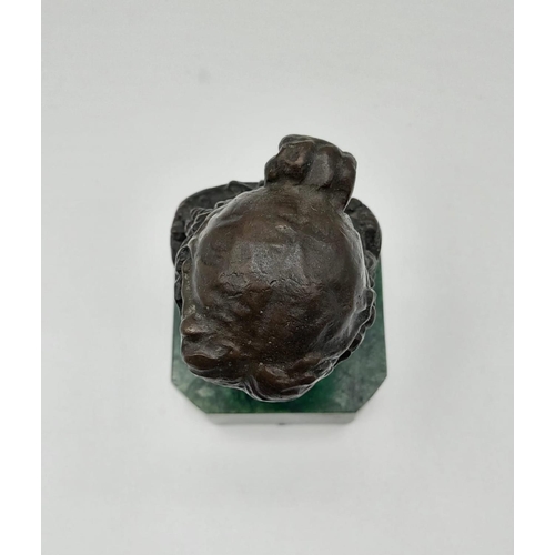 337 - A French Bronze Bust on a Malachite Base. Signed by the sculptor. 15.5cm tall.