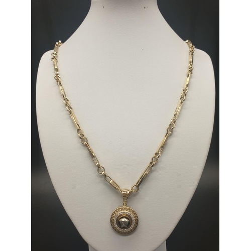 48 - 10ct yellow gold necklace with pendant and a matching bracelet, necklace length 62cm, bracelet 19cm.... 