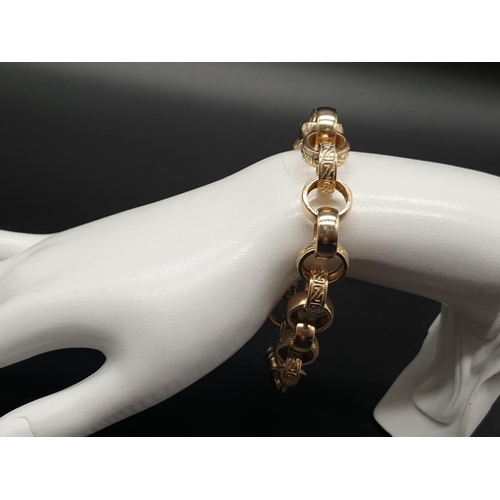 55 - 9ct yellow gold patterned belcher link bracelet. 24cm in length, Total weight 40 grams