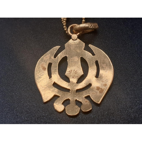 62 - A 22ct yellow gold necklace and pendant in a Khanda style design. Length of chain 48cm. Pendant leng... 