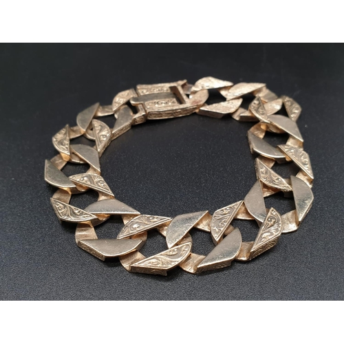 69 - 9ct yellow gold heavy curb bracelet, length 23cm, total weight 43 grams.